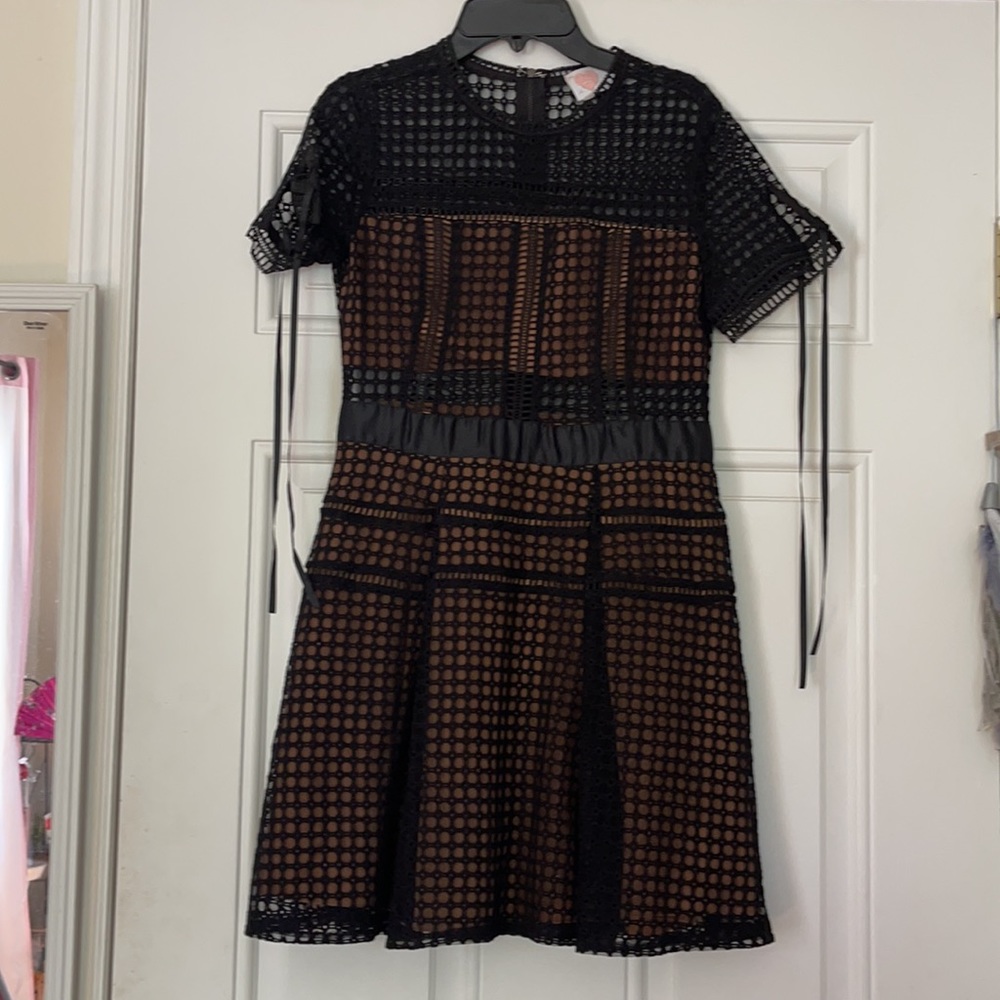 Short tulle and sheer dotted black dress